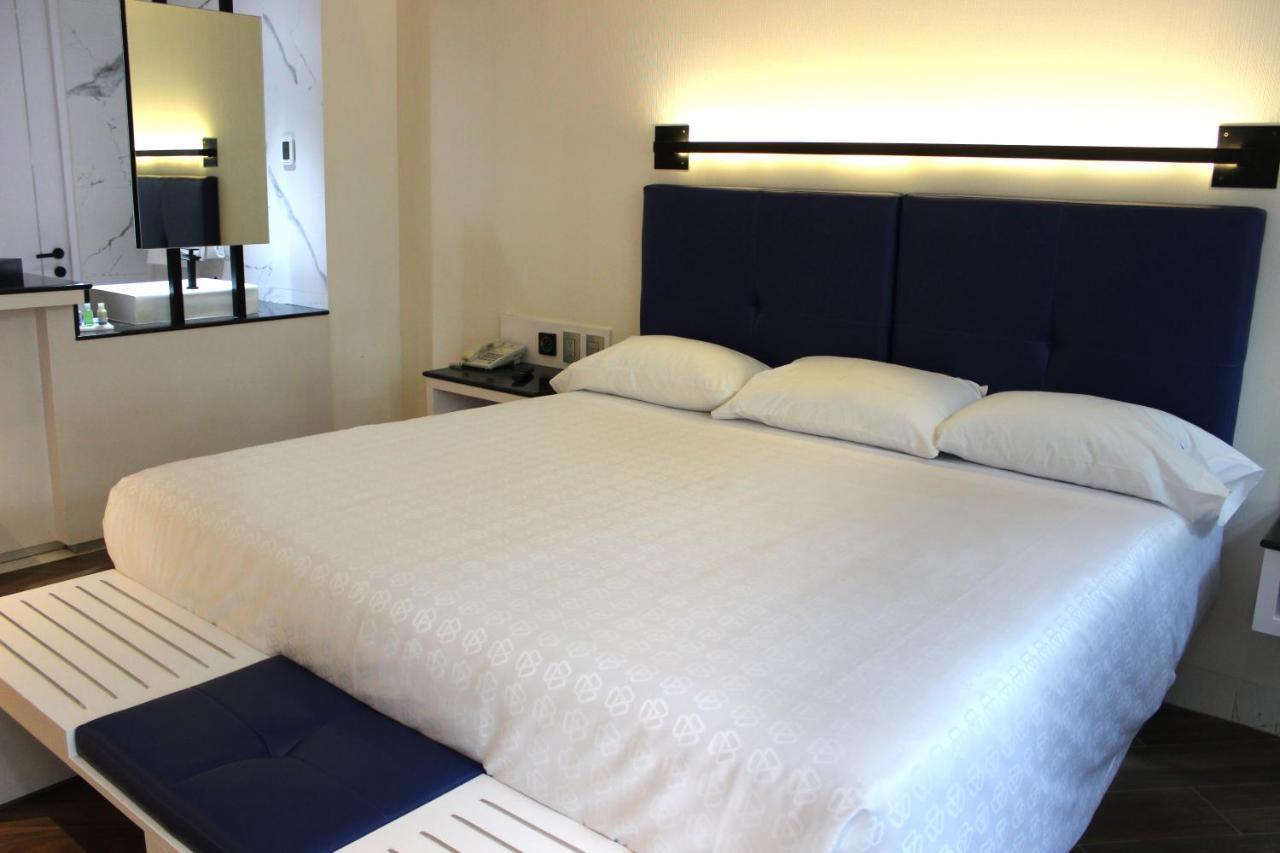 Weenjoy Hotels Grand Prix Aeropuerto Cdmx مدينة مكسيكو الغرفة الصورة